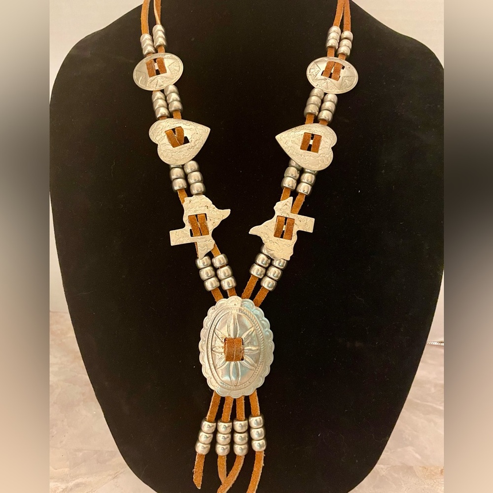 Bolo lariat necklace with etched hearts, circle, and Texas shapes on suede
